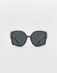 A pair of oversized, handmade acetate sunglasses featuring square-shaped, dark brown frames and dark-tinted lenses with 18-karat gold-plated arms, displayed against a plain white background. This is the Fahrenheit by For Art's Sake®.