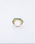 Introducing the Delta Ring by For Art's Sake®, featuring a yellow band adorned with an overlapping green design. The ring showcases a unique layered aesthetic with its wide, geometric shape and abstract form, giving it a modern, artistic look. Set against a plain white background, this ring presents a bold splash of color that stands out brilliantly.