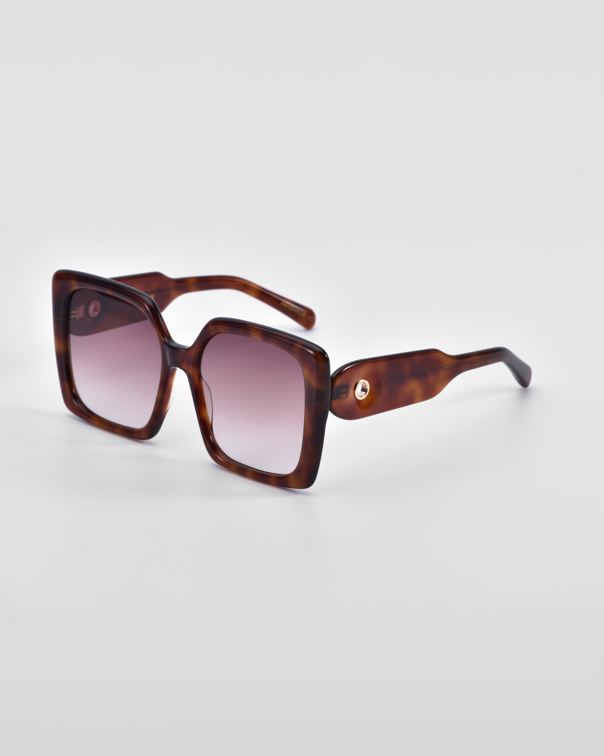 A pair of oversized soft-square sunglasses with brown tortoiseshell frames and gradient lenses. The thick frames feature classic temple round details and wide arms that taper as they extend. The **Eos** sunglasses by **For Art&#39;s Sake®** are positioned on a plain white background.