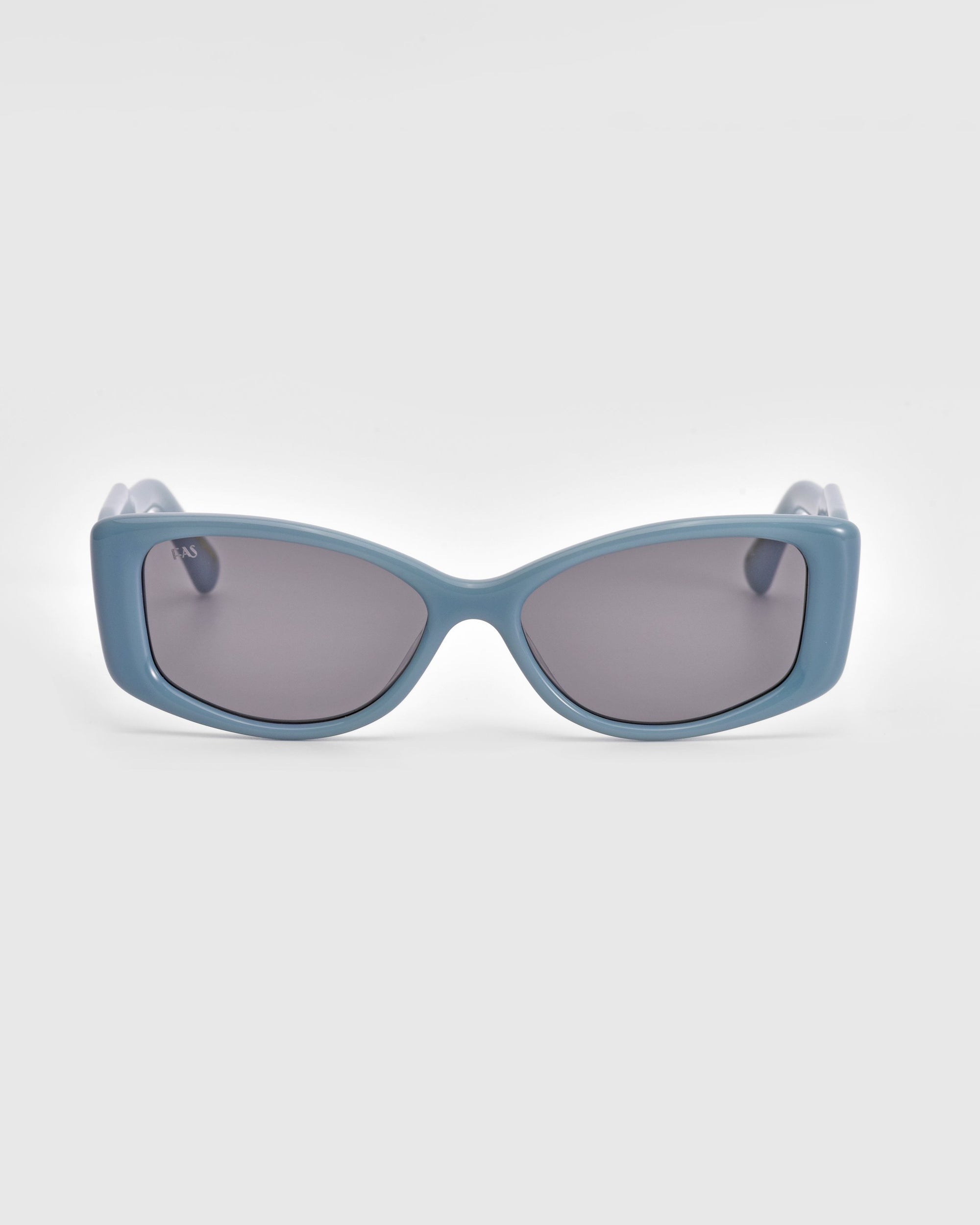 For Art's Sake® presents the elegant Mene sunglasses: luxurious blue rectangular frames with dark lenses, set against a plain white background.