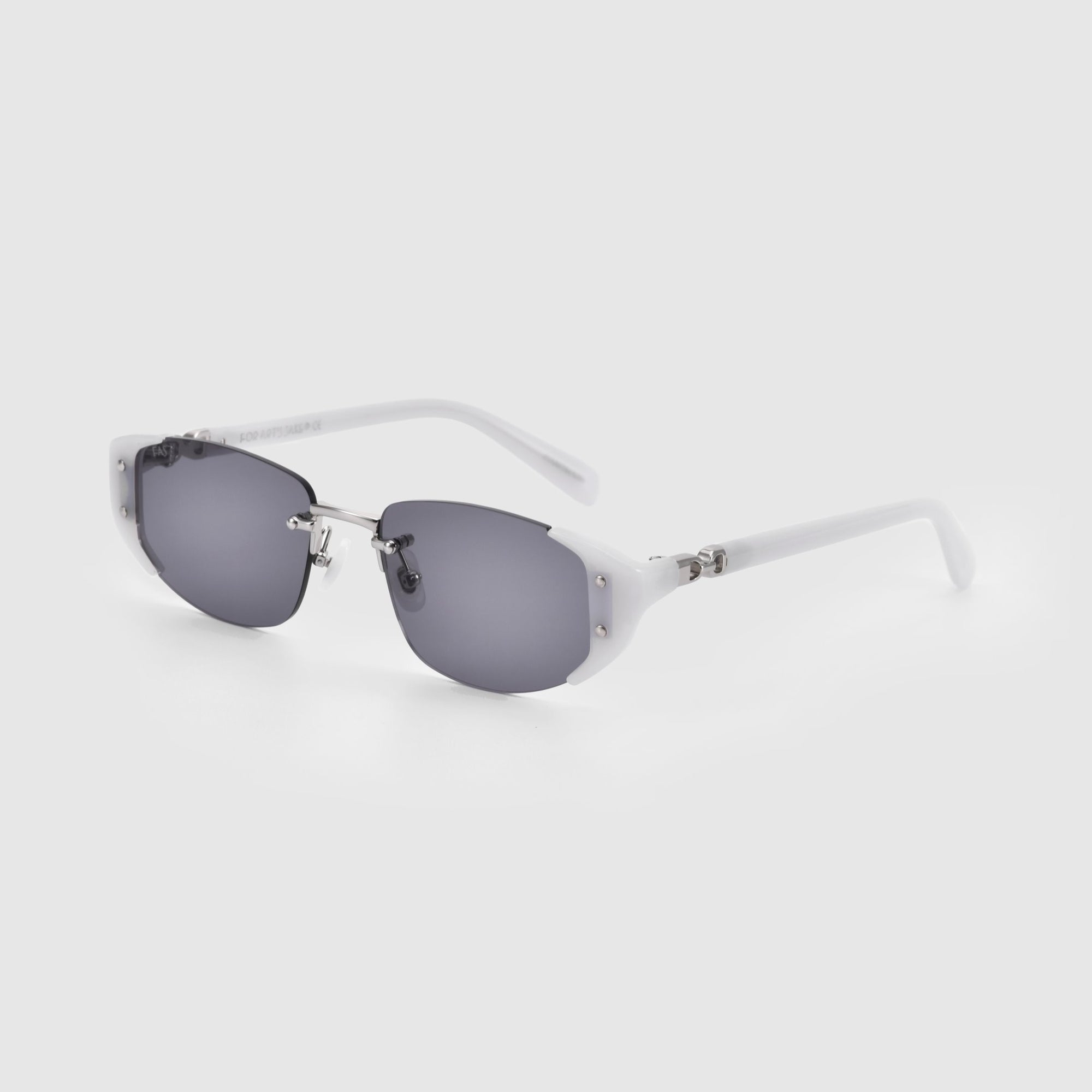 A pair of For Art&#39;s Sake® Harbour sunglasses features dark, oval-shaped lenses supported by a minimalist silver bridge and secured with small screws. The thin white arms and jade-stone nose pads contribute to a sleek and modern look, all neatly displayed against a plain white background.