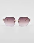 A pair of stylish, oversized hexagonal Serpent II sunglasses from For Art's Sake® with gradient lenses that transition from dark purple at the top to lighter at the bottom. The sunglasses feature 18-karat gold plating on the temples and a sleek, minimalist design. They are set against a plain white background.