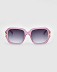 Introducing Frankie by For Art's Sake®: a pair of oversized geometric sunglasses featuring thick, chunky acetate frames in a striking pink color with gradient lenses. The temples are adorned with small triangular gold accents near the hinges, set against a plain white background.