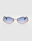 Introducing the For Art's Sake® Empress sunglasses: a pair of stylish luxury eyewear featuring oversized hexagonal gold frames and blue gradient lenses. These sunglasses offer UV protection and come with black temple tips for added comfort. The image is set against a plain white background.