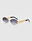 A pair of Empress luxury sunglasses by For Art's Sake® with gold-colored frames and dark, rectangular lenses is pictured against a plain white background. The temples are primarily gold, with black tips. The design is modern and sleek, offering both style and UV protection for your eyes.