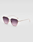 The For Art's Sake® Cece Sunglasses, showcasing rose gold frames and dark gradient lenses, are displayed on a white background. The frames feature a subtle geometric shape with thin temples, a delicate nose bridge, and adjustable nose pads.