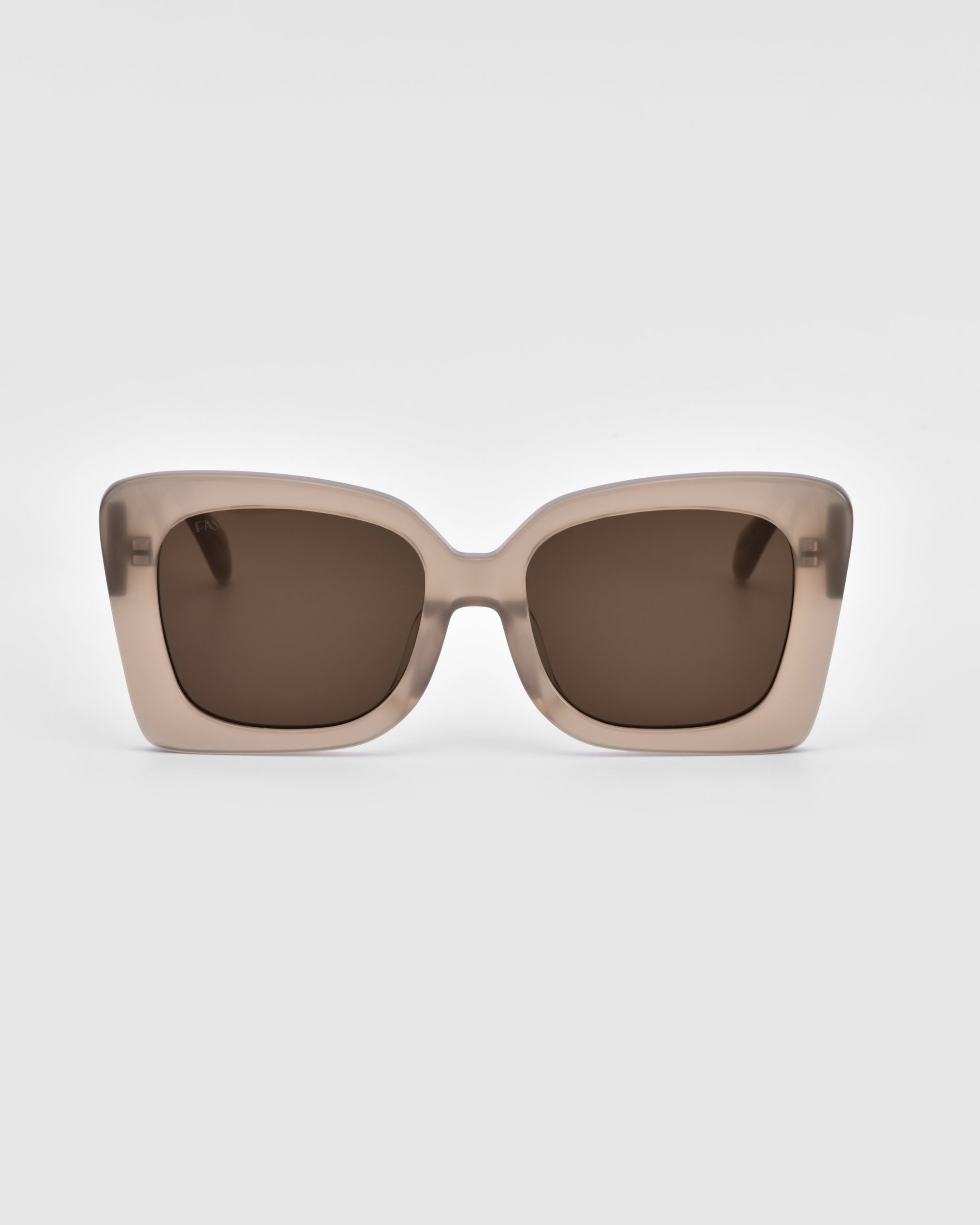 A pair of For Art&#39;s Sake® Ribbon sunglasses with rectangular, thick light beige frames and dark brown lenses. These sustainable sunglasses feature slightly rounded edges and a modern, stylish look, set against a plain white background.