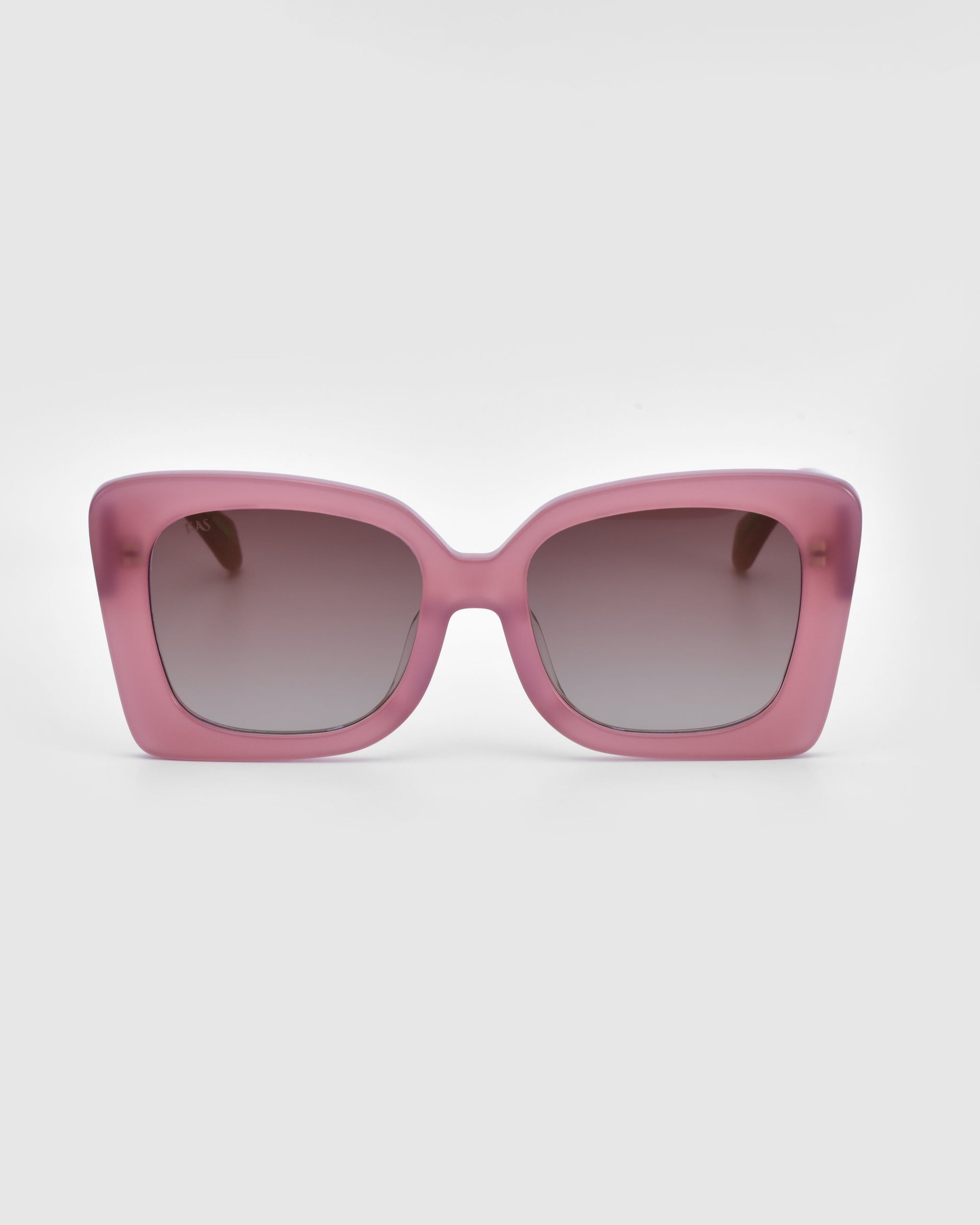 A pair of oversized, square-shaped Ribbon Sunglasses by For Art&#39;s Sake®, featuring pink frames and dark gradient lenses, set against a plain white background.