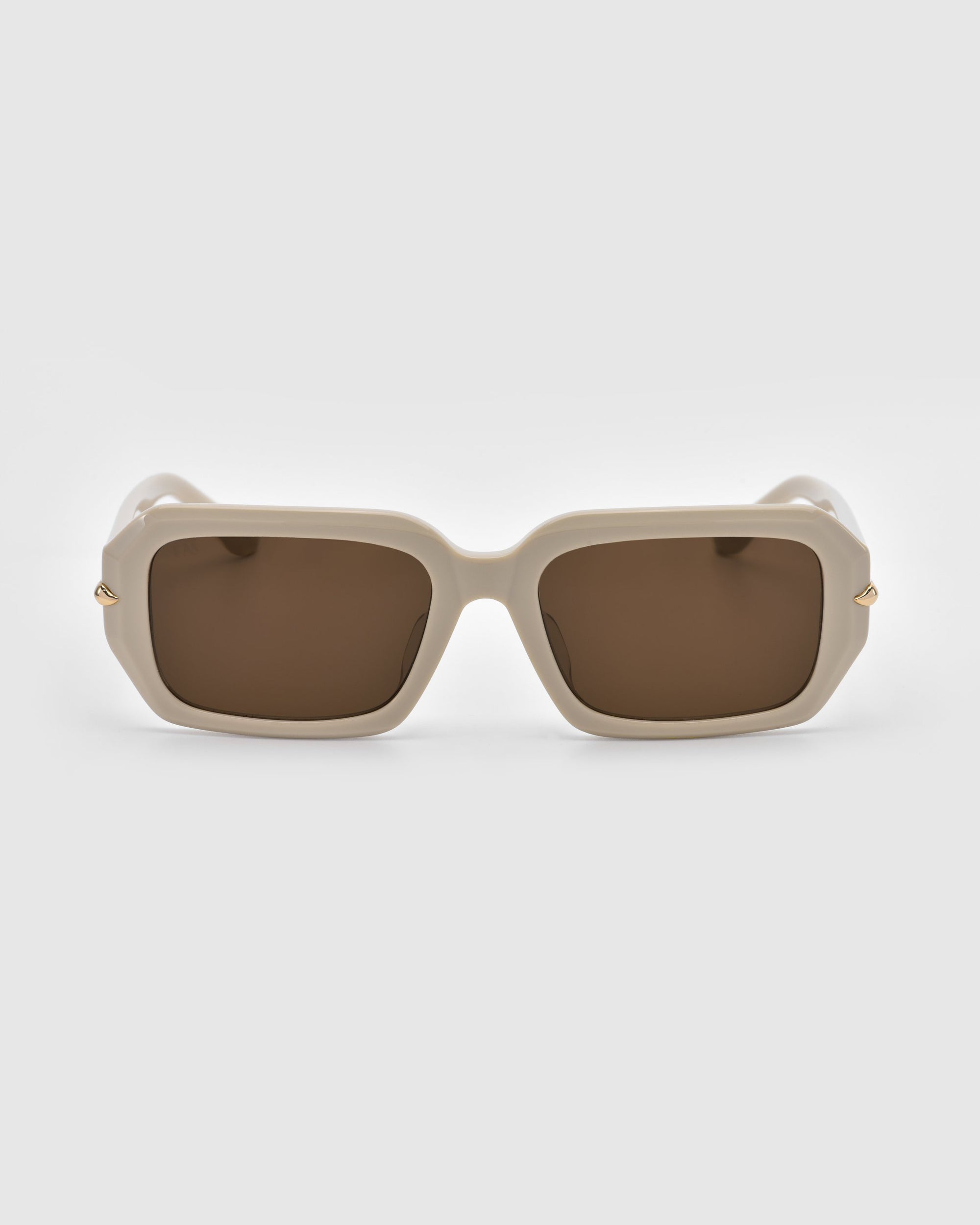 The For Art's Sake® Fleur sunglasses feature a white acetate frame with rectangular shape, dark lenses, and small gold-accented hinges, set against a light gray background.