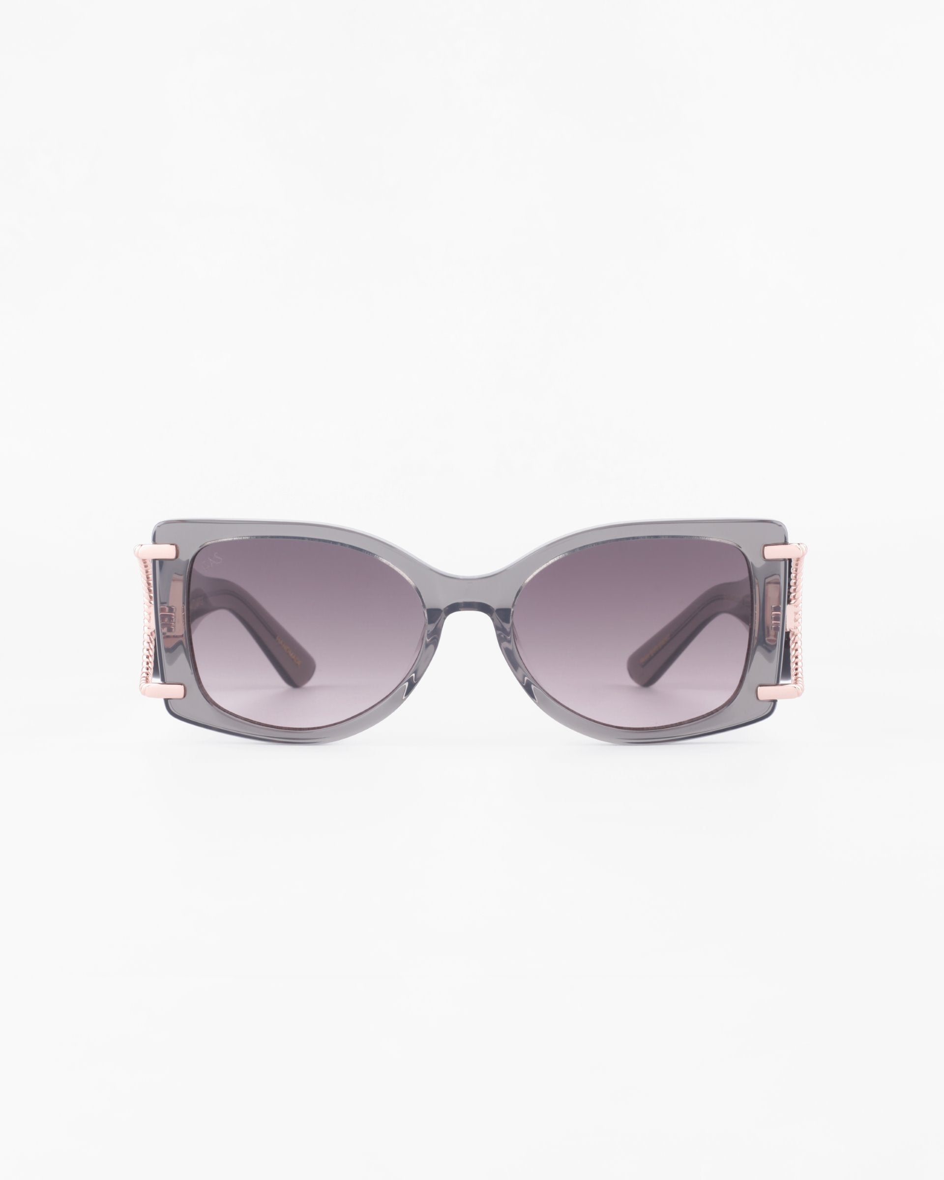 A pair of stylish, large, square-shaped acetate sunglasses with dark grey lenses and black frames. The sides of the frames feature an 18-karat gold-plated detail near the hinges, adding a touch of elegance to the design. These For Art's Sake® Sculpture sunglasses offer 100% UVA & UVB protection and are set against a plain white background.