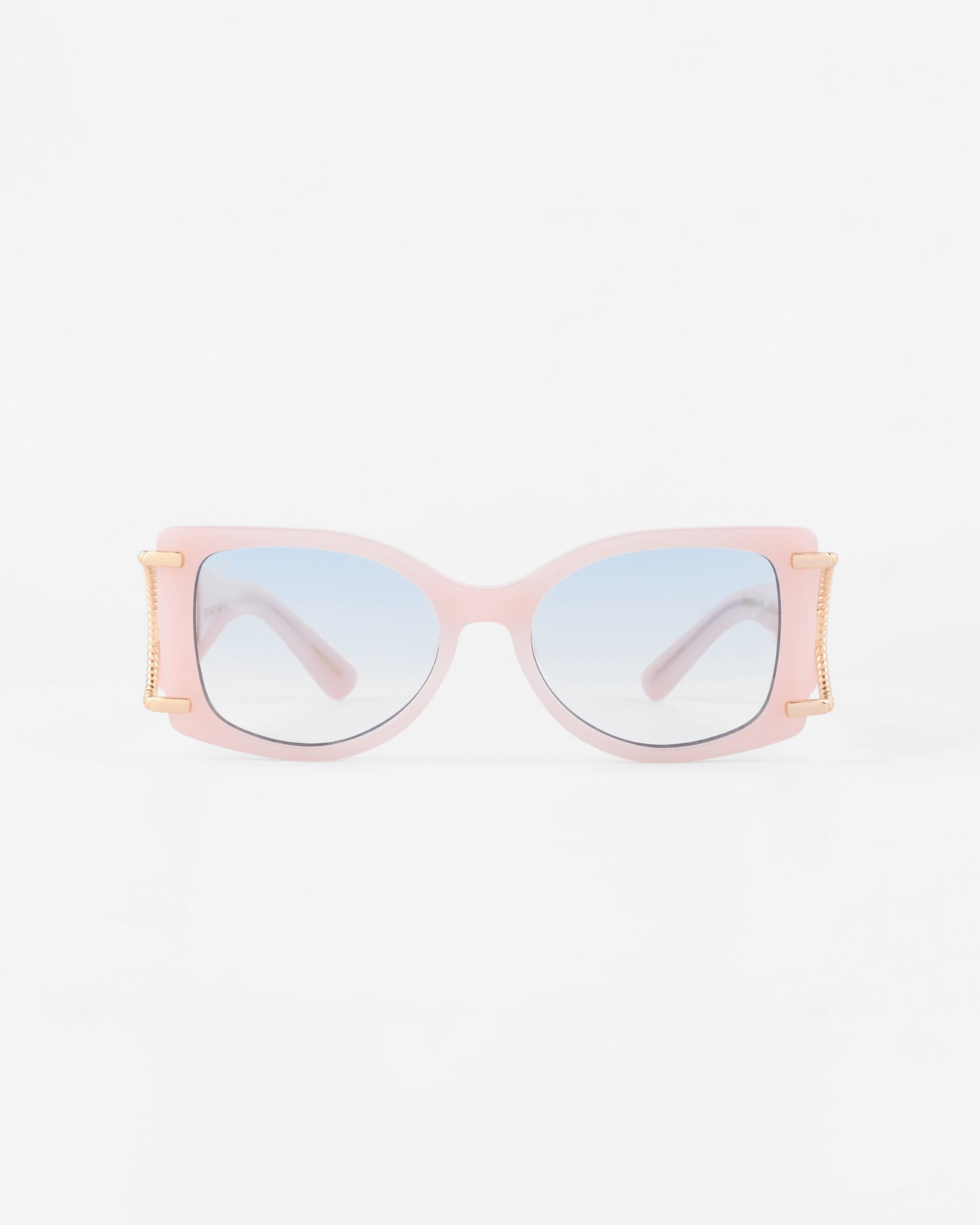 A pair of stylish pink oversized square acetate sunglasses with gradient lenses, named Sculpture by For Art&#39;s Sake®. The sunglasses feature 18-karat gold-plated accents on the temples and provide 100% UVA &amp; UVB protection. The background is plain white.