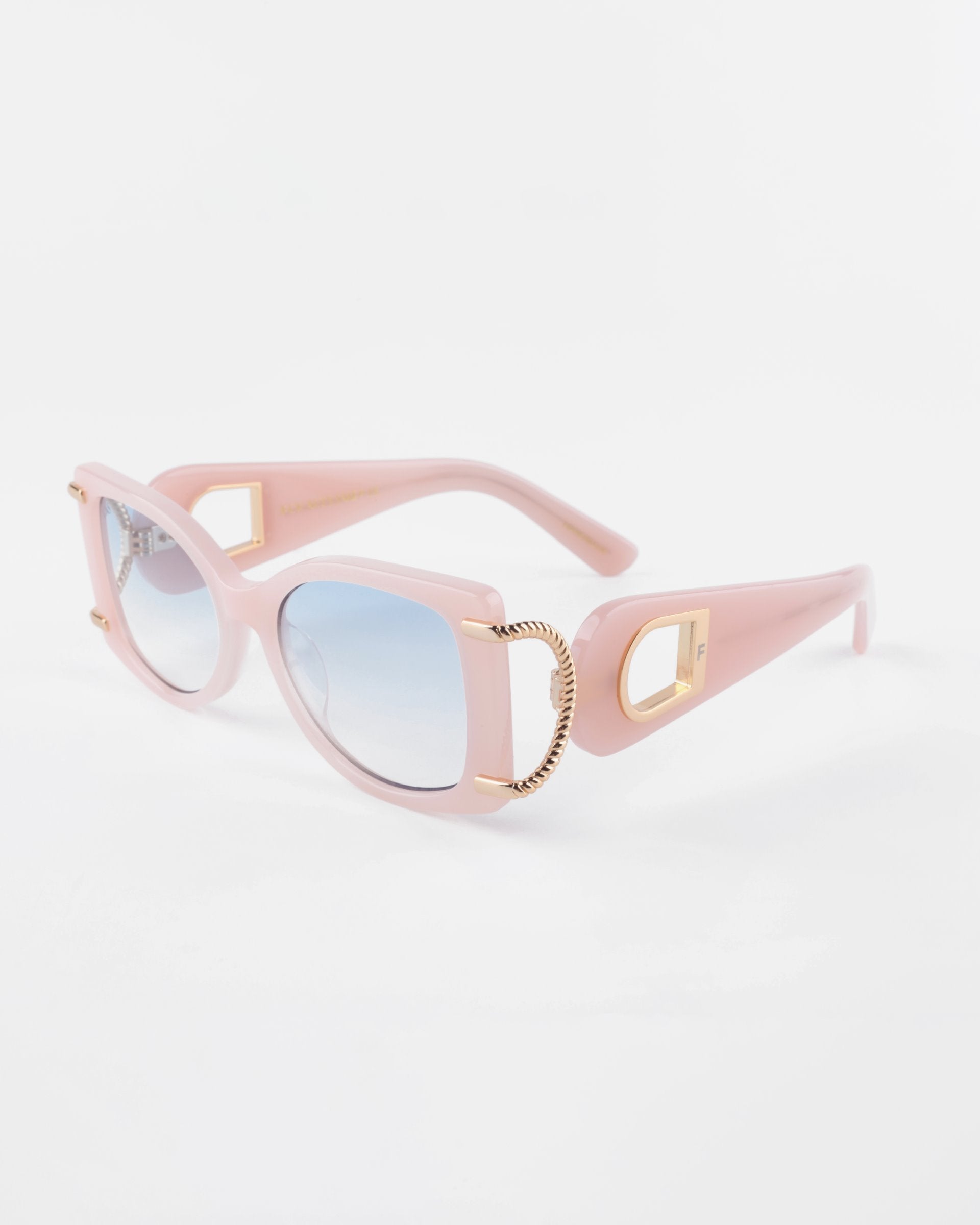 Sculpture by For Art&#39;s Sake®: Pink oversized acetate sunglasses with rectangular blue-tinted lenses. The frames feature 18-karat gold-plated accents around the hinges and a decorative gold chain detail on the temples. The arms are thick with a slight curve, offering 100% UVA &amp; UVB protection in a stylishly retro design.
