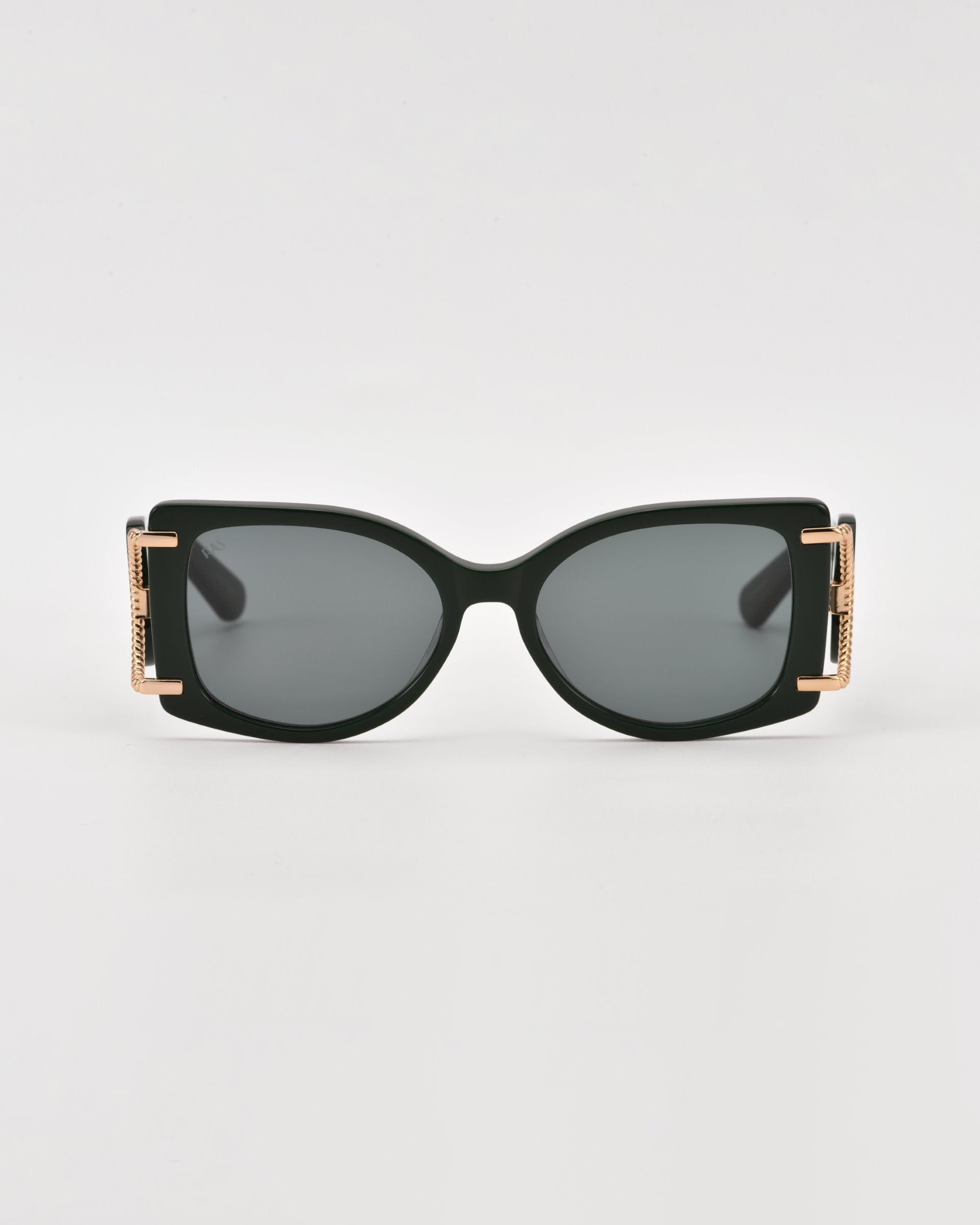A pair of For Art's Sake® Sculpture black rectangular acetate sunglasses with dark lenses. The arms of the sunglasses feature 18-karat gold-plated accents near the hinges, adding a touch of elegance. These For Art's Sake® Sculpture sunglasses, offering 100% UVA & UVB protection, are set against a plain white background.