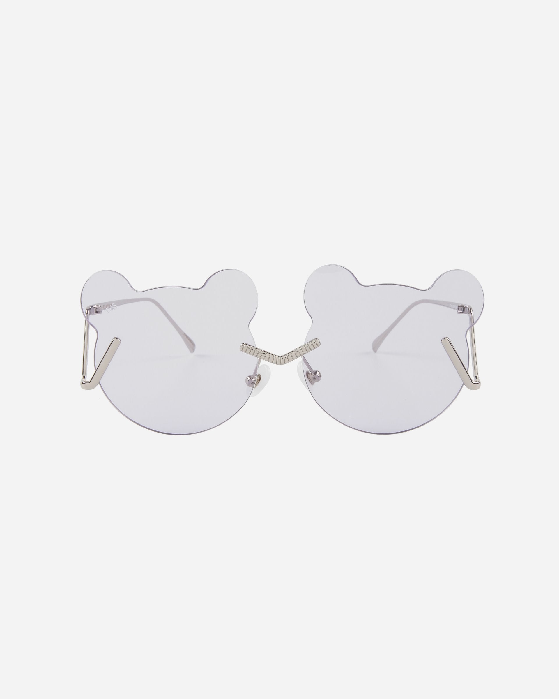 A pair of Teddy sunglasses by For Art's Sake® with lenses shaped like bear heads. The thin, metallic stainless steel frames and adjustable nosepads ensure a comfortable fit. The light, translucent shade offers UV protection, making the overall design playful and whimsical yet functional.