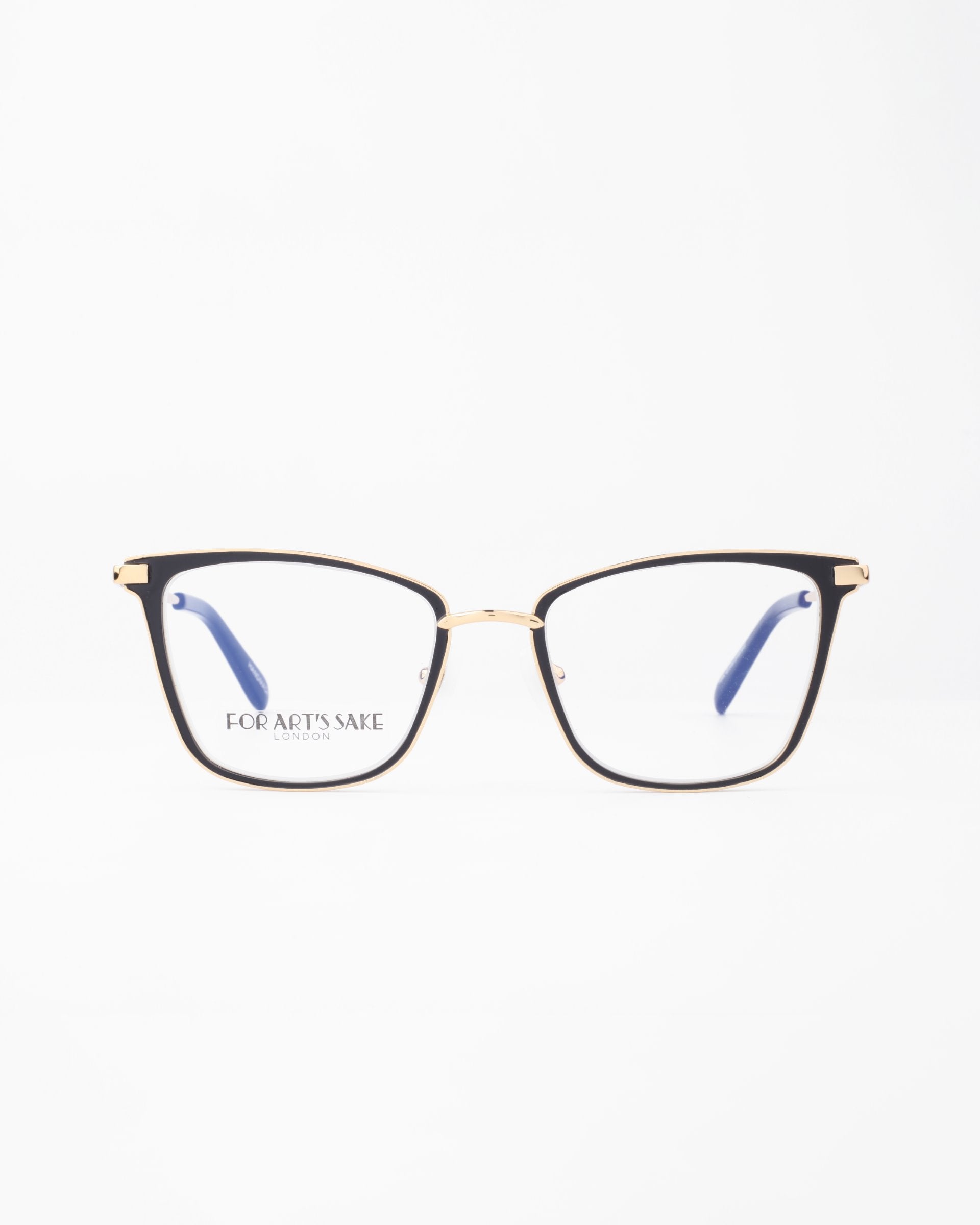 A pair of eyeglasses with thin 18-karat gold-plated frames and black accents on the upper rims are displayed against a white background. The temples&#39; tips are blue, and the brand name &quot;For Art&#39;s Sake®&quot; is visible on the left lens. These stylish Windsor frames also feature a blue light filter for added eye protection.