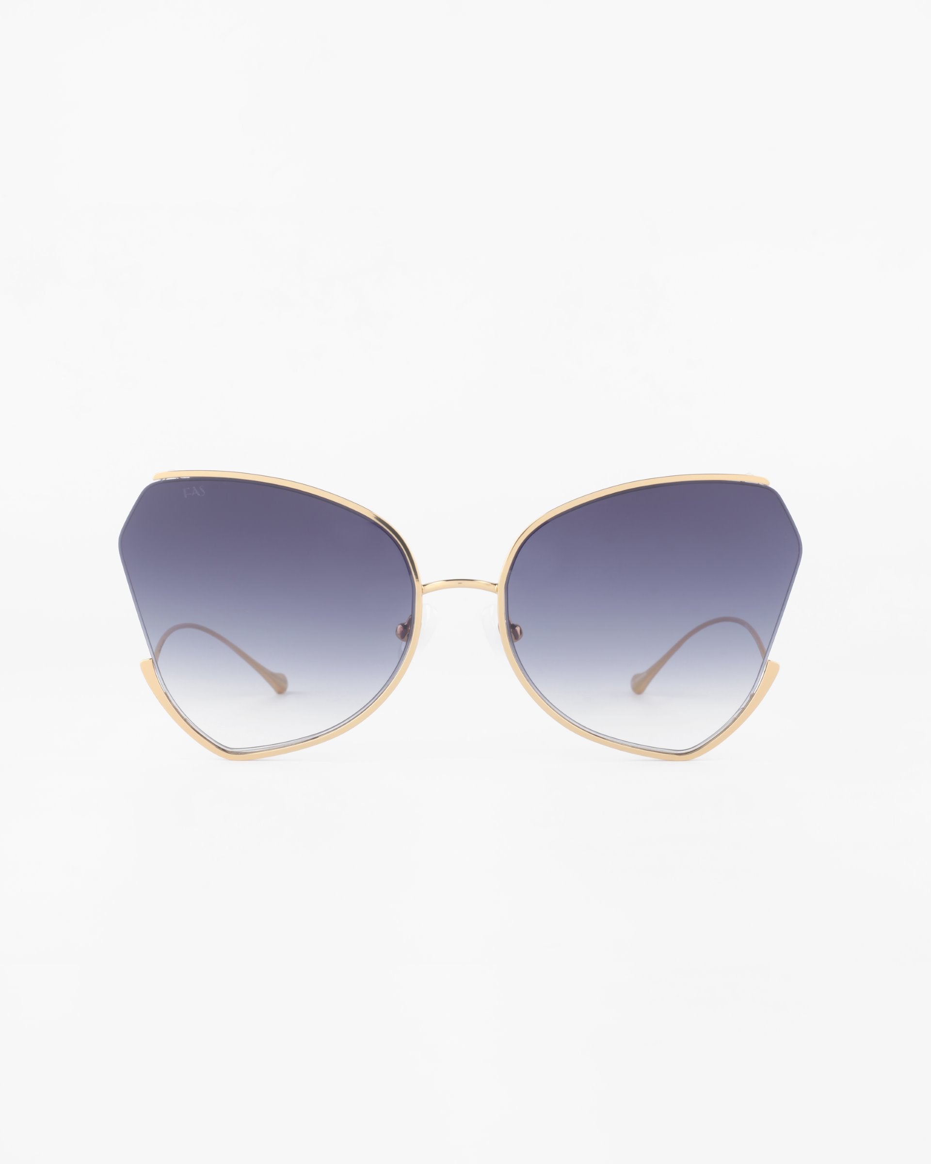 A pair of stylish For Art&#39;s Sake® Watercolour sunglasses with large, ombré lenses that fade from dark at the top to light at the bottom. The frame is thin and gold-plated stainless steel, featuring a unique butterfly silhouette that gives it a fashionable, modern look.