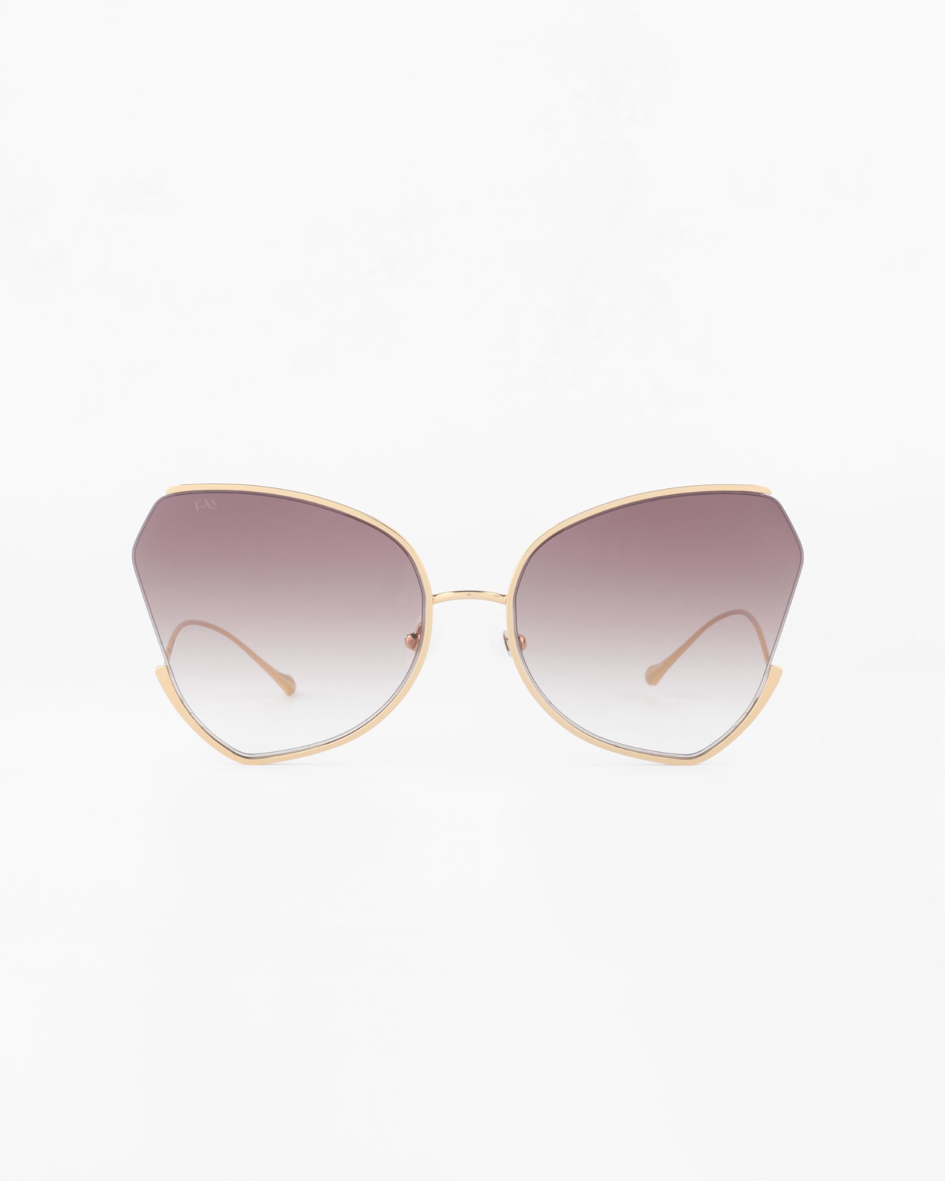 A pair of fashionable Watercolour sunglasses by For Art&#39;s Sake® with large, ombré lenses and thin, gold-plated stainless steel frames. The subtle cat-eye shape adds a stylish and retro flair to the design, while the butterfly silhouette brings an extra touch of elegance against a plain white background.