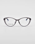 A pair of gray-framed eyeglasses with a cat-eye design, featuring 18-karat gold plating and the brand "For Art's Sake®" inscribed on one lens, is centered against a plain white background. The model is called Perla II.