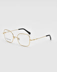 A pair of Bone II by For Art's Sake® with thin, gold metallic wireframe construction and rectangular lenses are shown against a plain white background. The temples have black tips for added comfort.