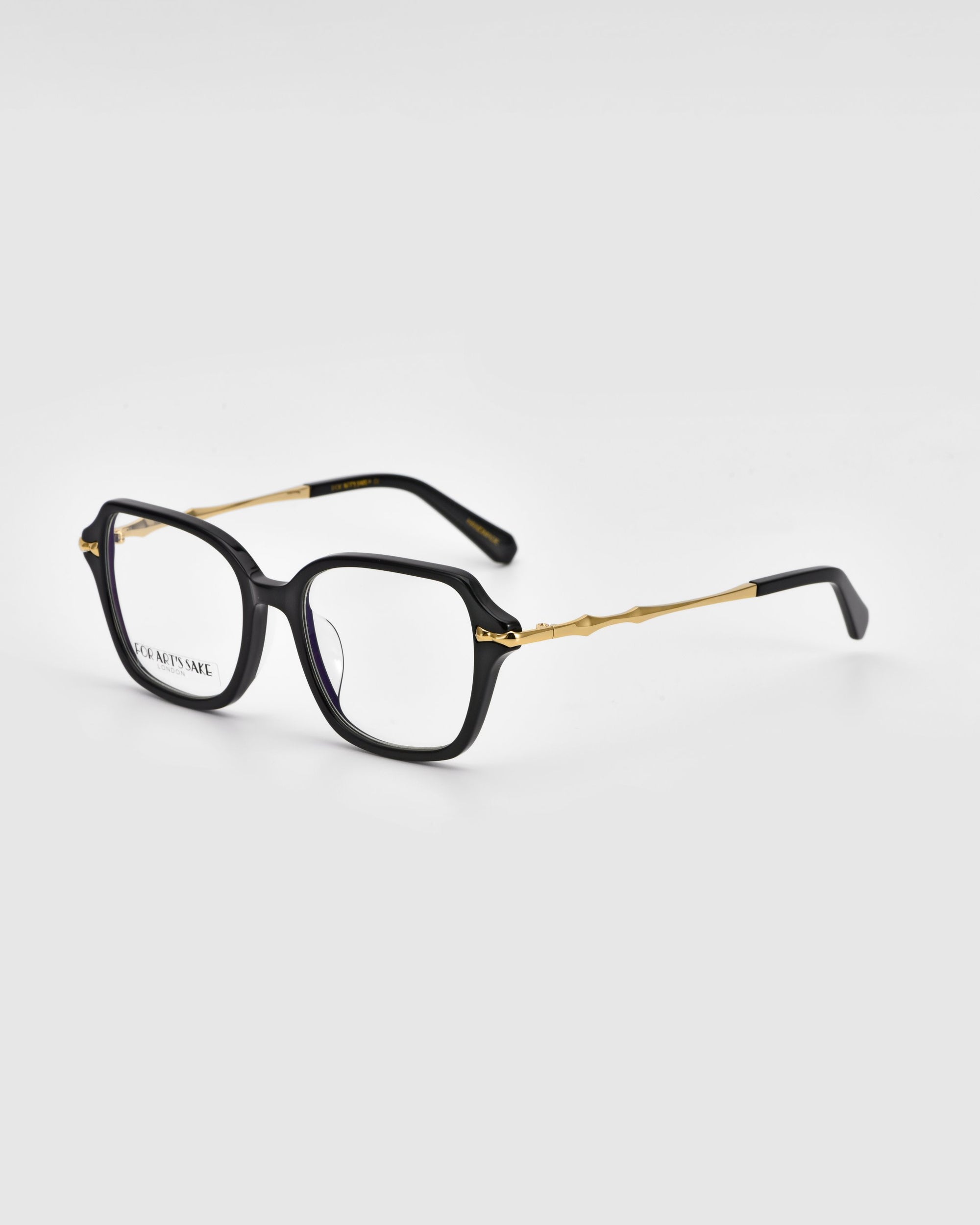 For Art&#39;s Sake® Delight: A pair of black rectangular eyeglasses adorned with gold detailing on the arms. The frame exudes modern sophistication, while the temples feature a subtle, elegant bend. The clear lenses are set against a plain white background.