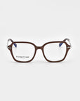 The Delight eyeglasses by For Art's Sake® exude modern sophistication with their rectangular lenses and brown frames. The arms feature a unique metal design near the hinges, transitioning to a darker color towards the ends. The brand name "For Art's Sake®" is visible on one lens against the white background.