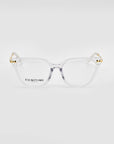 The Lexie eyeglasses from For Art's Sake® exude modern sophistication with their clear frames and gold-accented hinges. Featuring transparent lenses with "FOR ART'S SAKE LONDON" printed on the left lens, these glasses are displayed against a white background, offering a subtle touch of vintage charm to any ensemble.