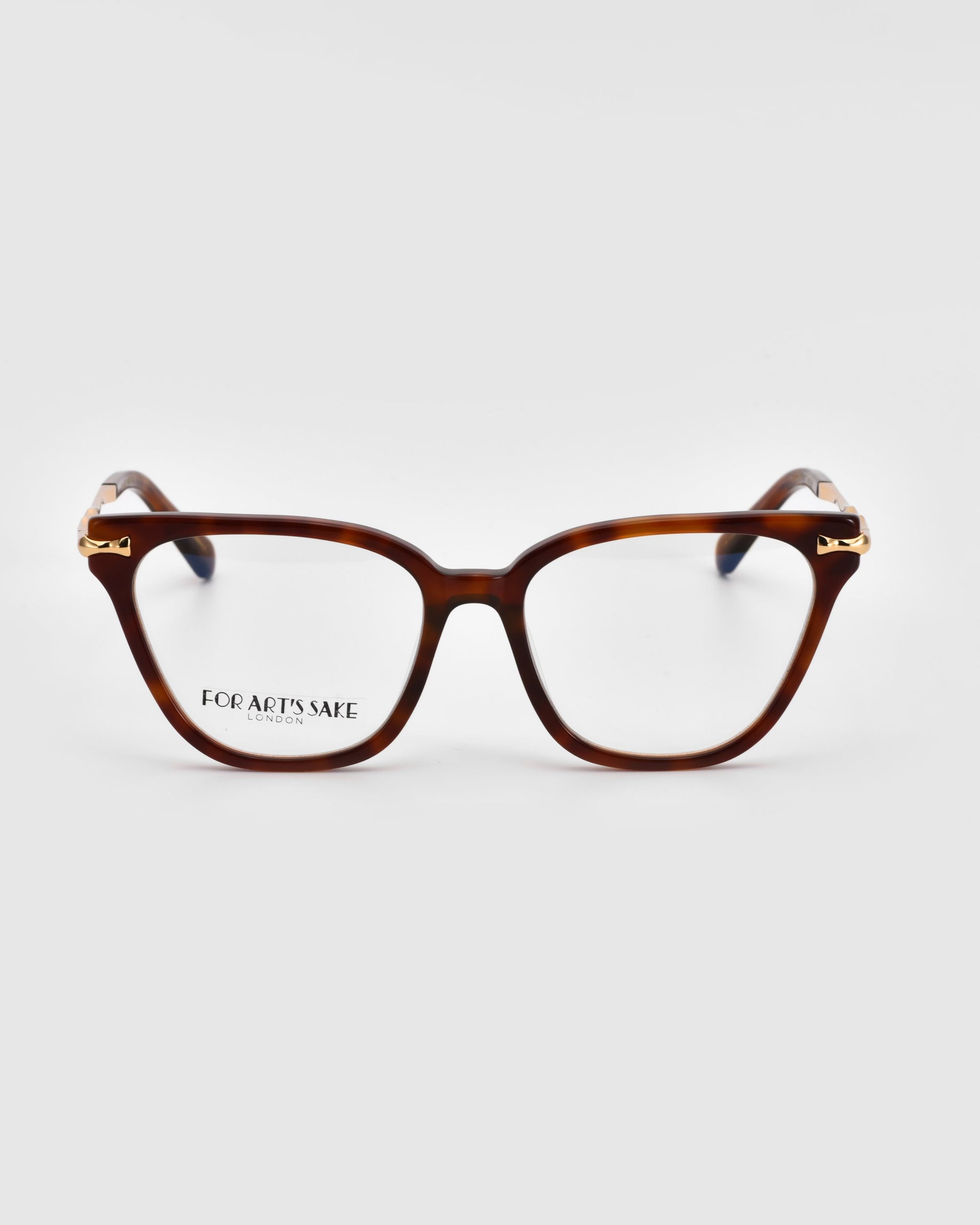 A pair of square-shaped eyeglasses with brown tortoiseshell frames is centered against a plain white background. The brand name "For Art's Sake®" is visible on the left lens, available exclusively at Lexie Opticals under the product name "Lexie.