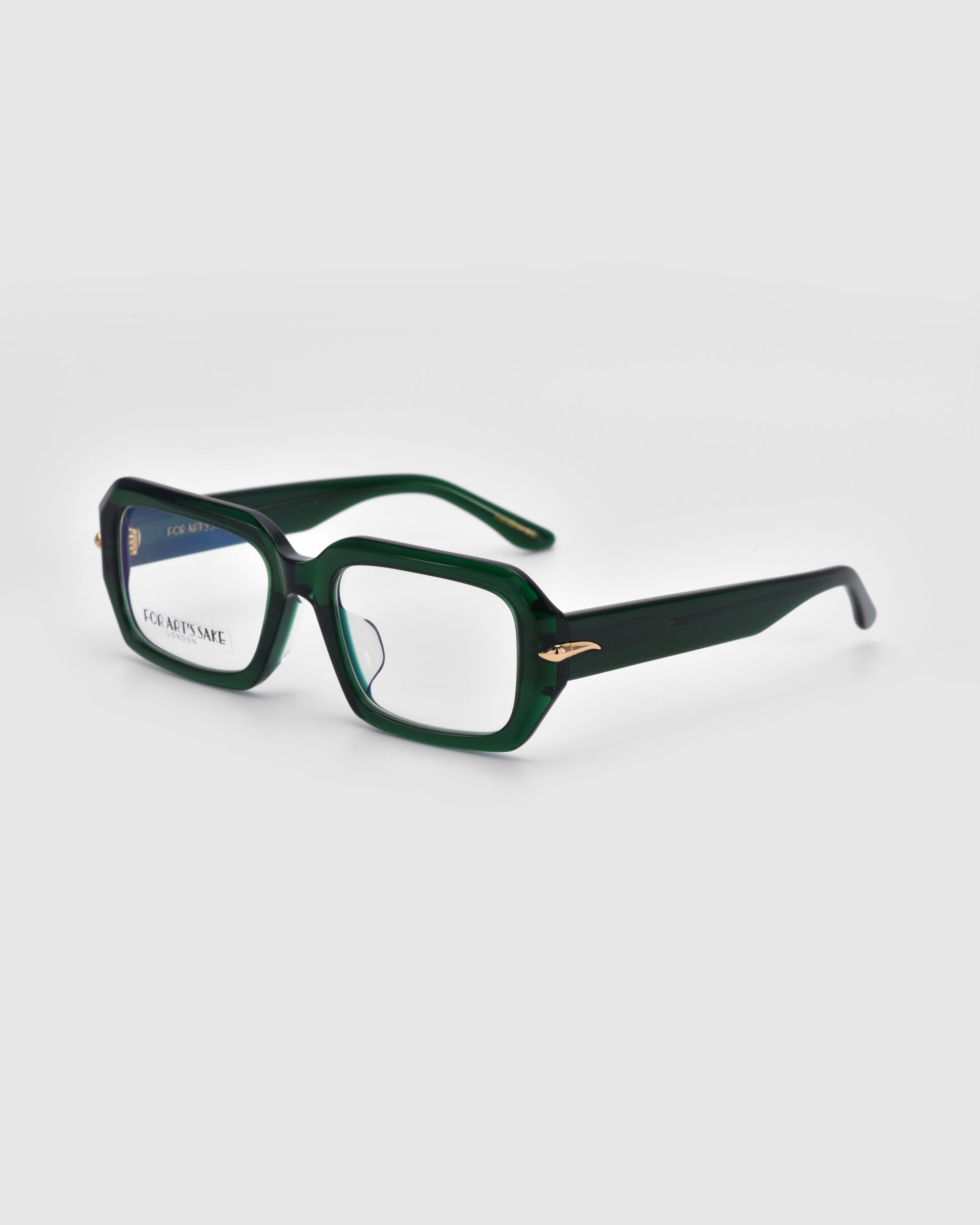 The Petal by For Art&#39;s Sake® are green rectangular eyeglasses crafted from chunky acetate against a white background. They showcase a sleek, modern design with a small metallic accent near the hinges.