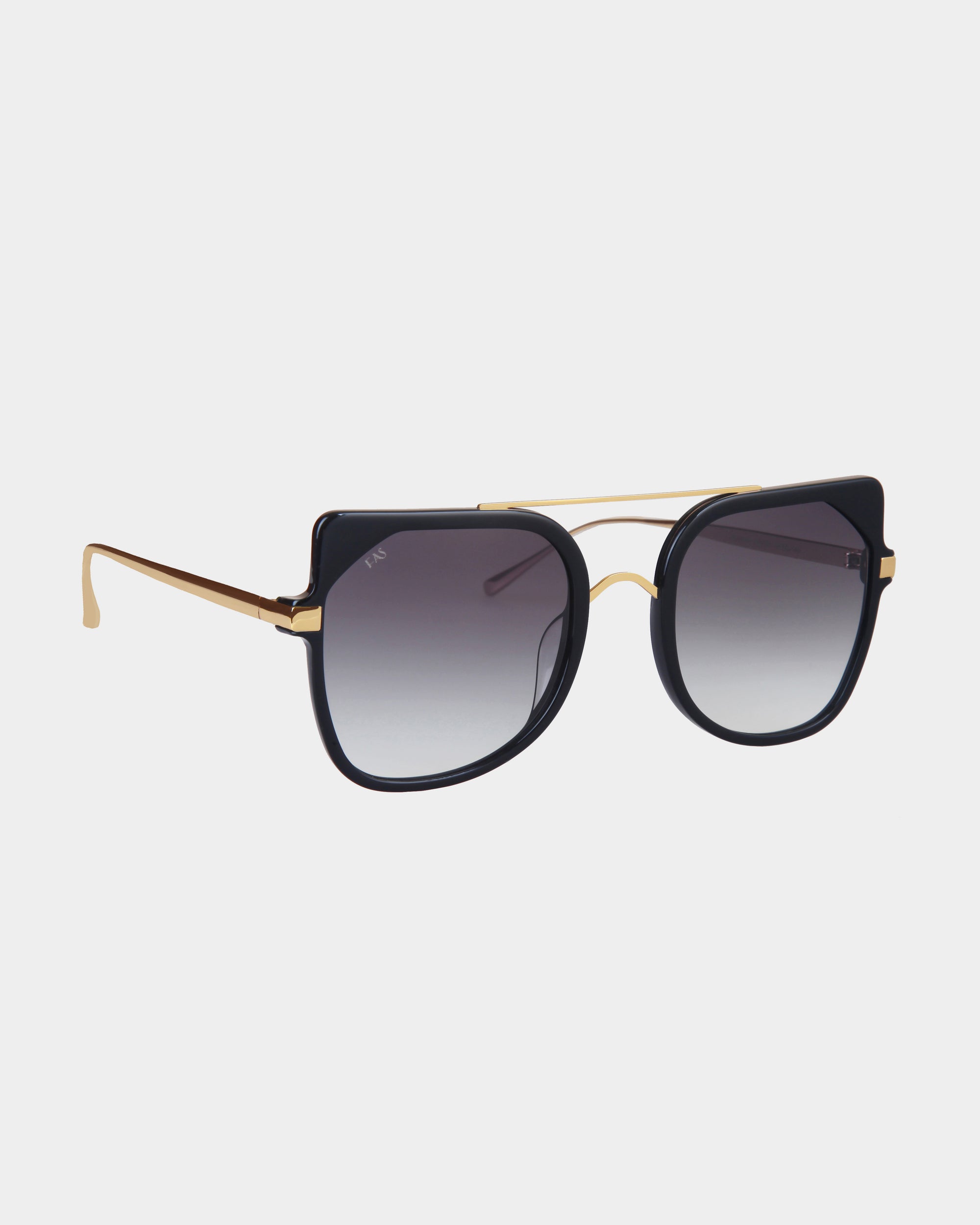 For Art&#39;s Sake® Big Game sunglasses feature a sleek aviator-style design with dark, gradient nylon lenses, a black upper frame, and gold accents. The thin gold bridge and temples add a modern and stylish touch while providing UV protection. The gradient lenses transition from dark at the top to lighter at the bottom.