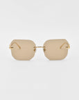 A pair of stylish For Art's Sake® Aria sunglasses featuring frameless, diamond-cut lenses with a rectangular, brown tint and gold metal arms. Jade-stone nose pads add a touch of elegance as they rest gently on the plain white background.