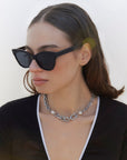 Crocodile Sunglasses, Black. Image on Model. 